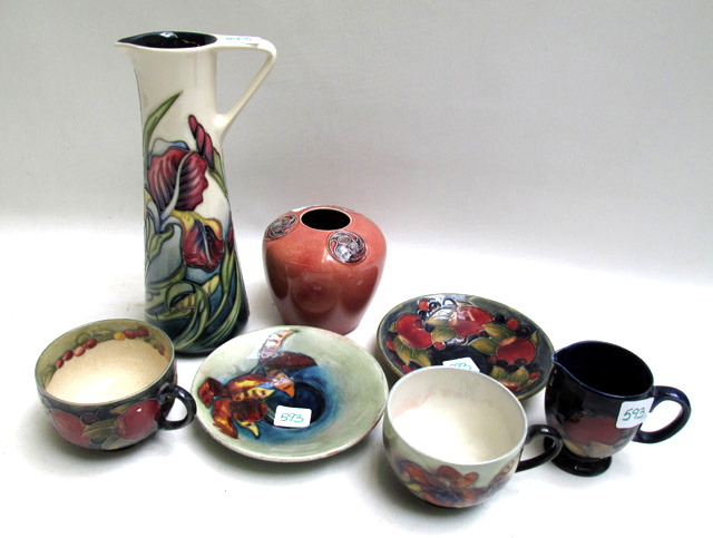 Appraisal: SEVEN PIECES OF MOORCROFT POTTERY in hand painted under glaze