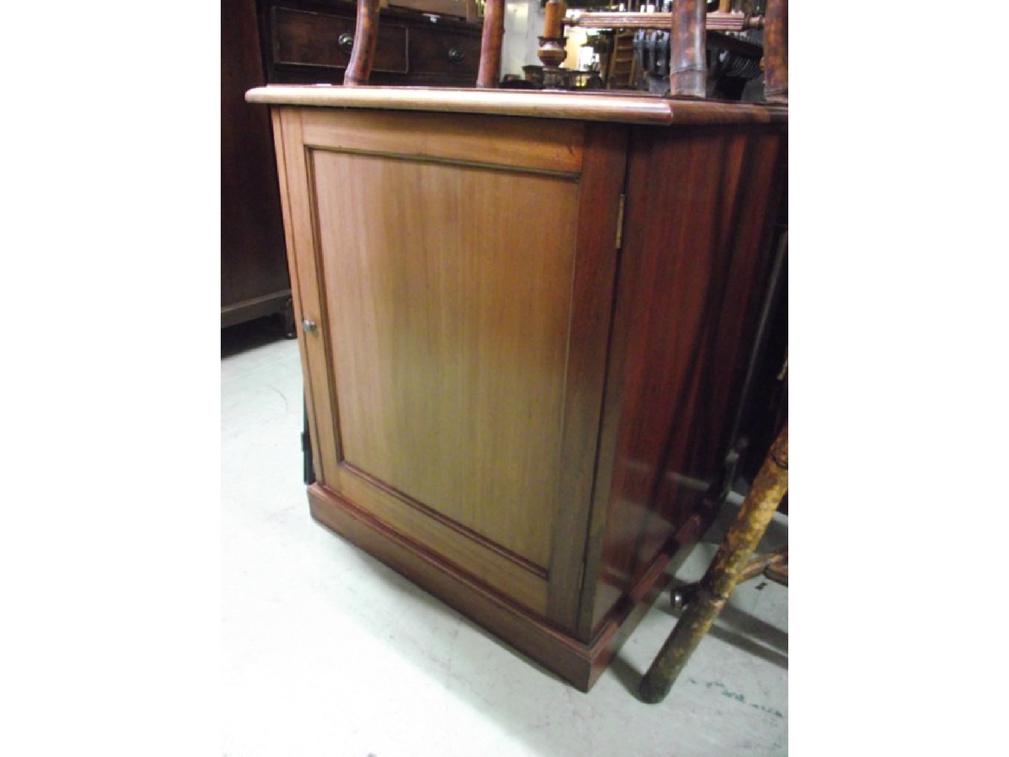 Appraisal: A th century mahogany low pedestal side cupboard of square