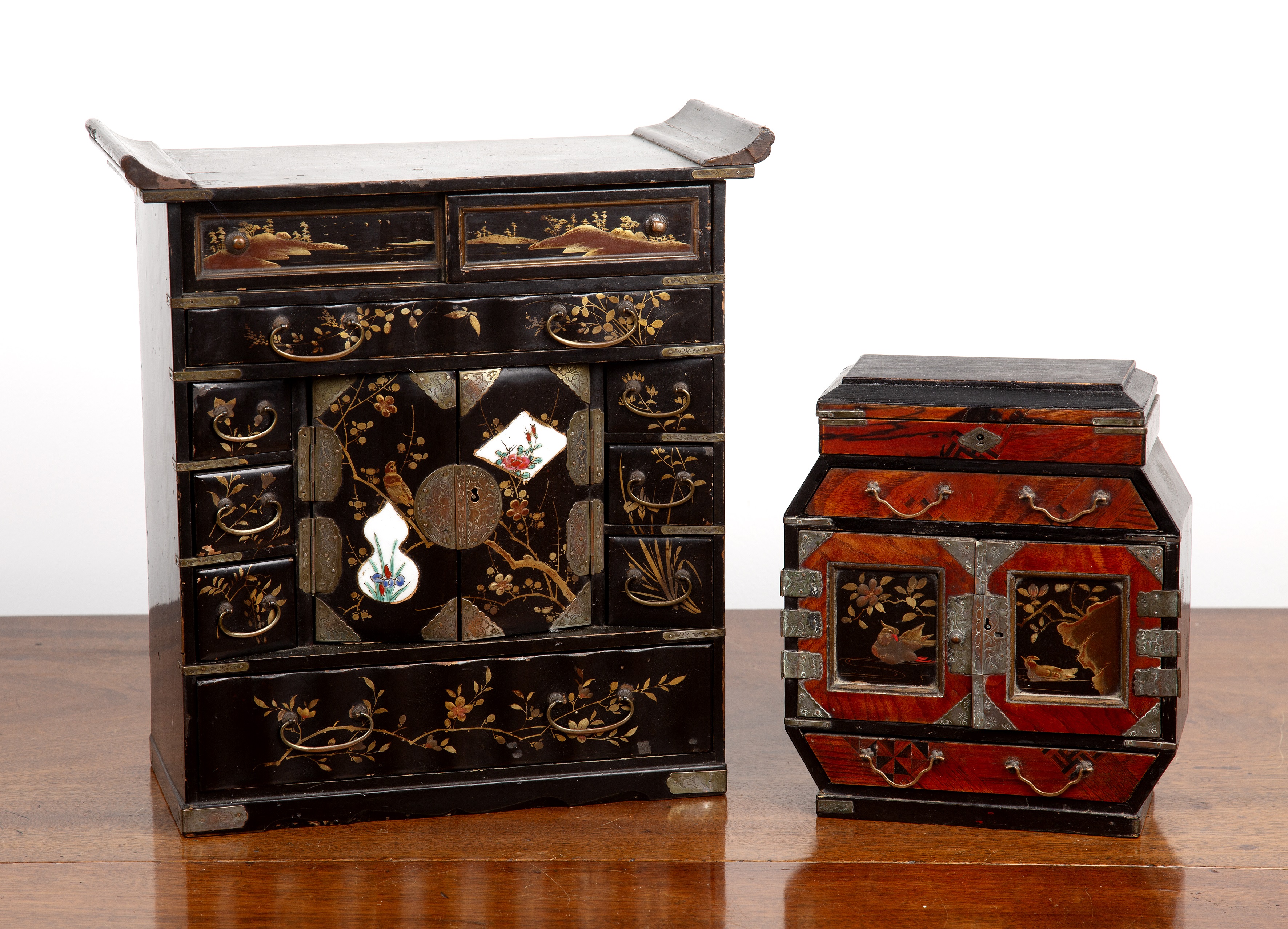 Appraisal: Japanese lacquered table top cabinet with porcelain panels inset into