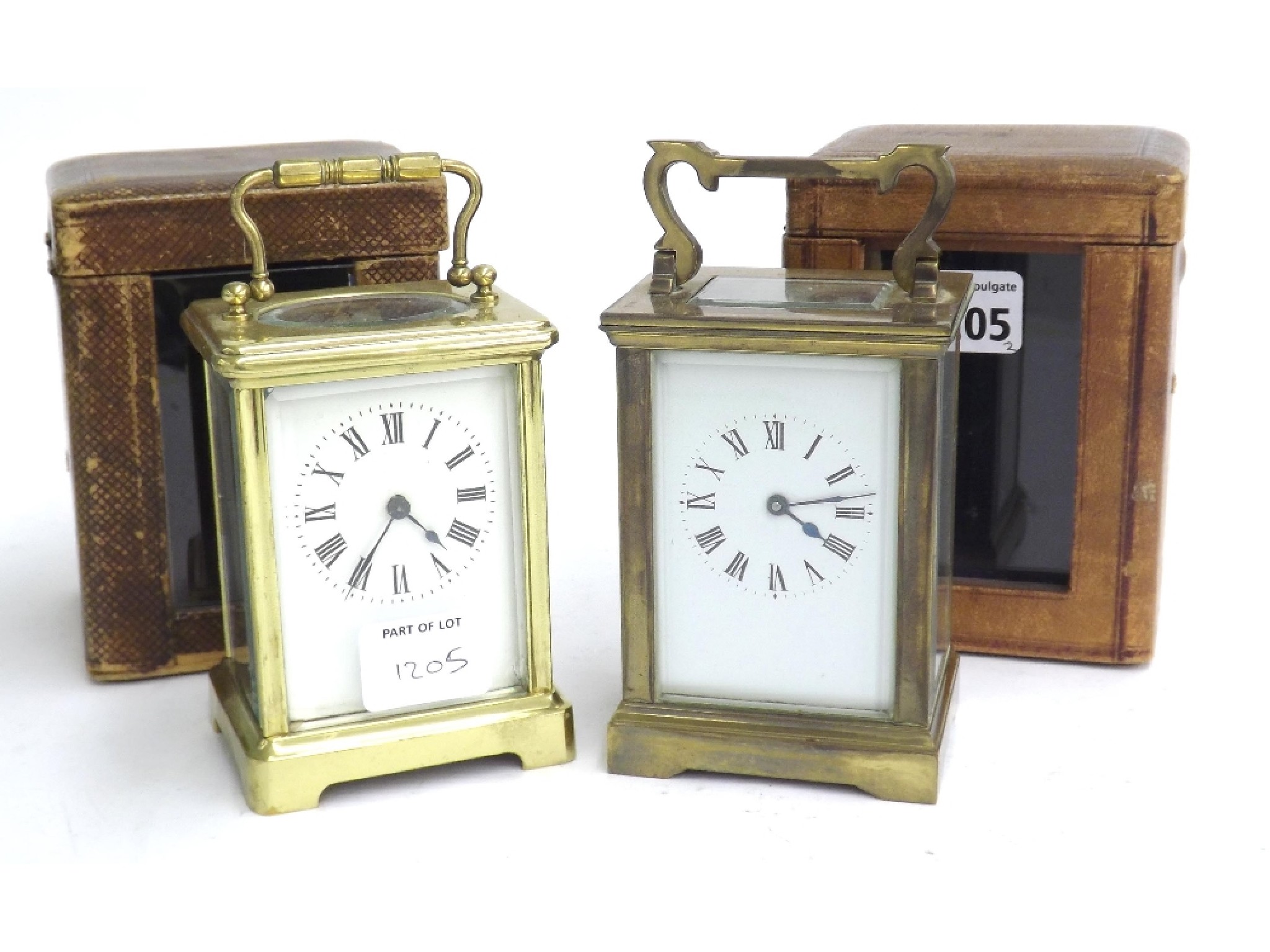 Appraisal: Two carriage clock timepieces within corniche brass cases both high