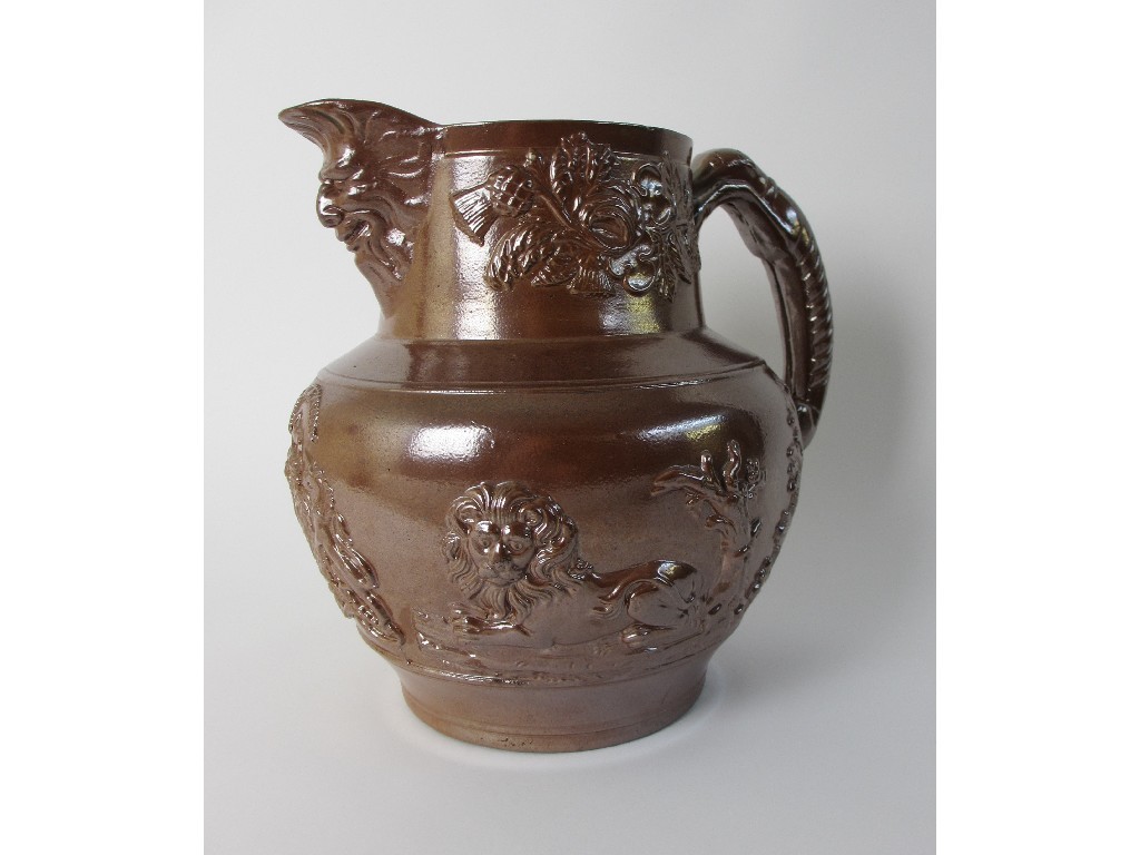 Appraisal: An English saltglaze stoneware jug applied in relief with national