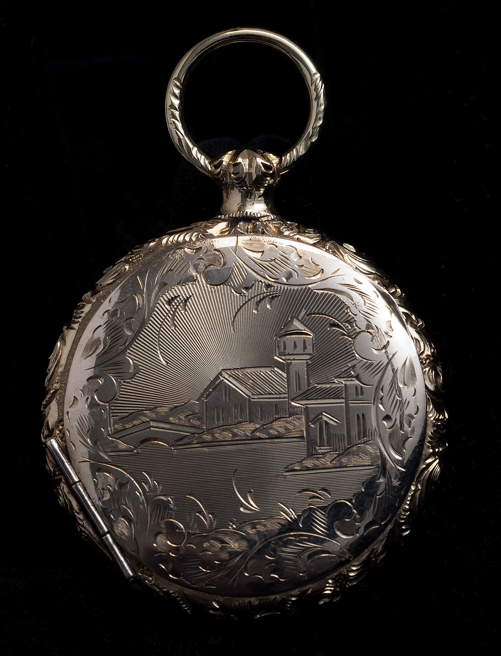 Appraisal: GOLD DOUBLE-SIDED LOCKET Set with ambrotype portrait of a woman