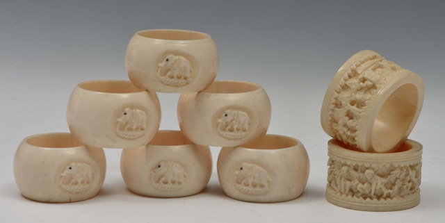 Appraisal: TWO CHINESE CARVED CANTON IVORY NAPKIN RINGS and six Indian