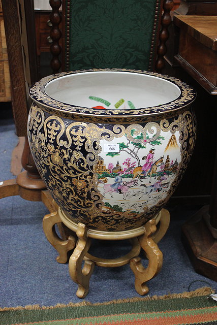 Appraisal: A LARGE ORIENTAL PORCELAIN FISH BOWL the interior decorated with