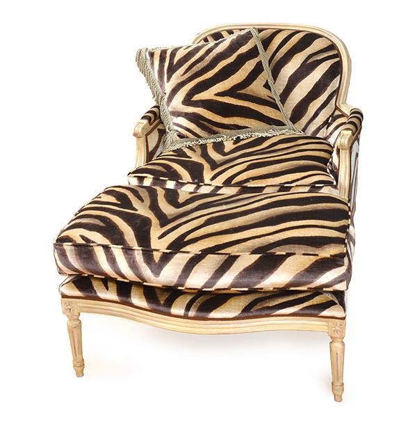 Appraisal: A LOUIS XVI STYLE BERGERE AND OTTOMAN WITH FAUX ZEBRA