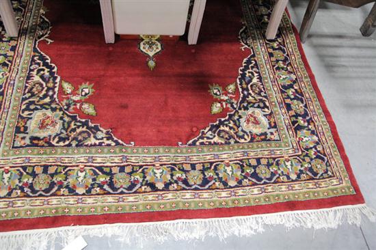 Appraisal: ORIENTAL STYLE RUG Area rug with deep red ground mutiple