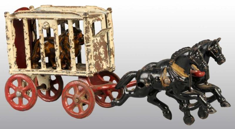 Appraisal: Cast Iron -Horse Royal Circus Cage Wagon Toy Description All