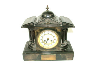 Appraisal: A slate cased mantel clock of architectural form the French