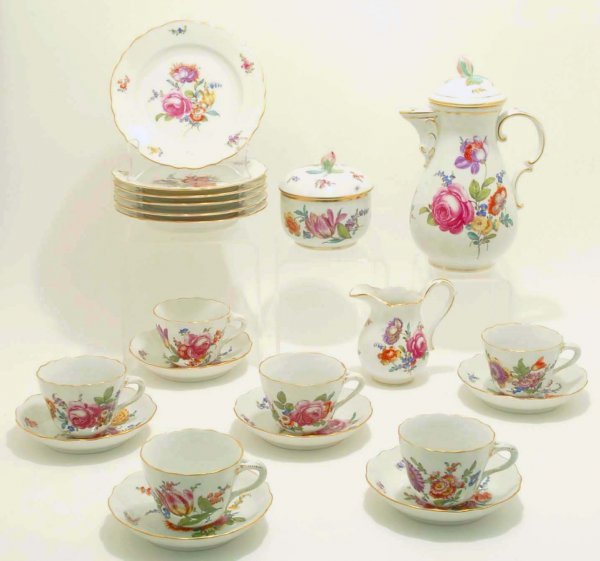 Appraisal: A handpainted porcelain tea set with polychrome floral sprays gilt