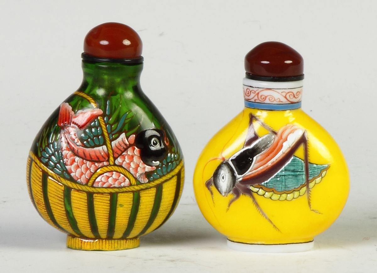 Appraisal: Two Snuff Bottles Enameled glass w fish cricket