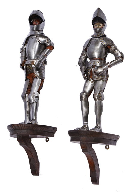 Appraisal: A PAIR OF CUT STEEL AND CARVED WOOD MODELS OF