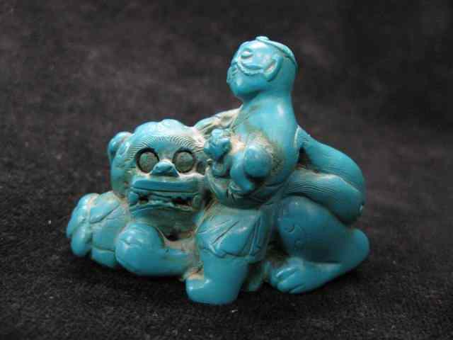 Appraisal: Carved Chinese Turquoise Figurine of Man Foo Dog fine detail