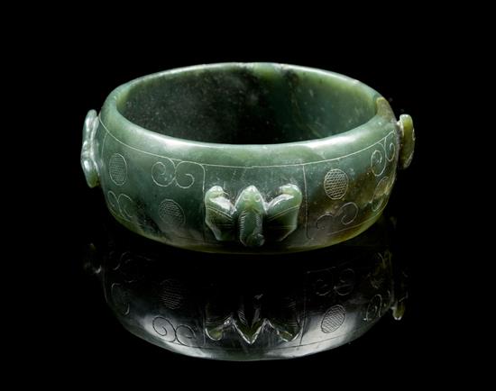 Appraisal: Sale Lot A Carved Spinach Jade Bracelet with bat decoration