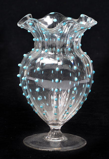 Appraisal: A SMALL STOURBRIDGE GLASS VASE with flaring rim and baluster