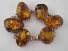 Appraisal: An amber and silver bracelet