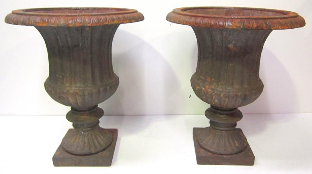 Appraisal: TWO CAST IRON URNS TWO CAST IRON URNS No Entry