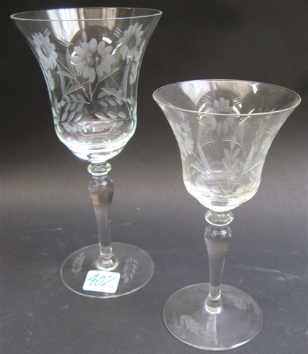 Appraisal: TWO SETS OF AMERICAN ENGRAVED CRYSTAL GOBLETS pieces engraved flower