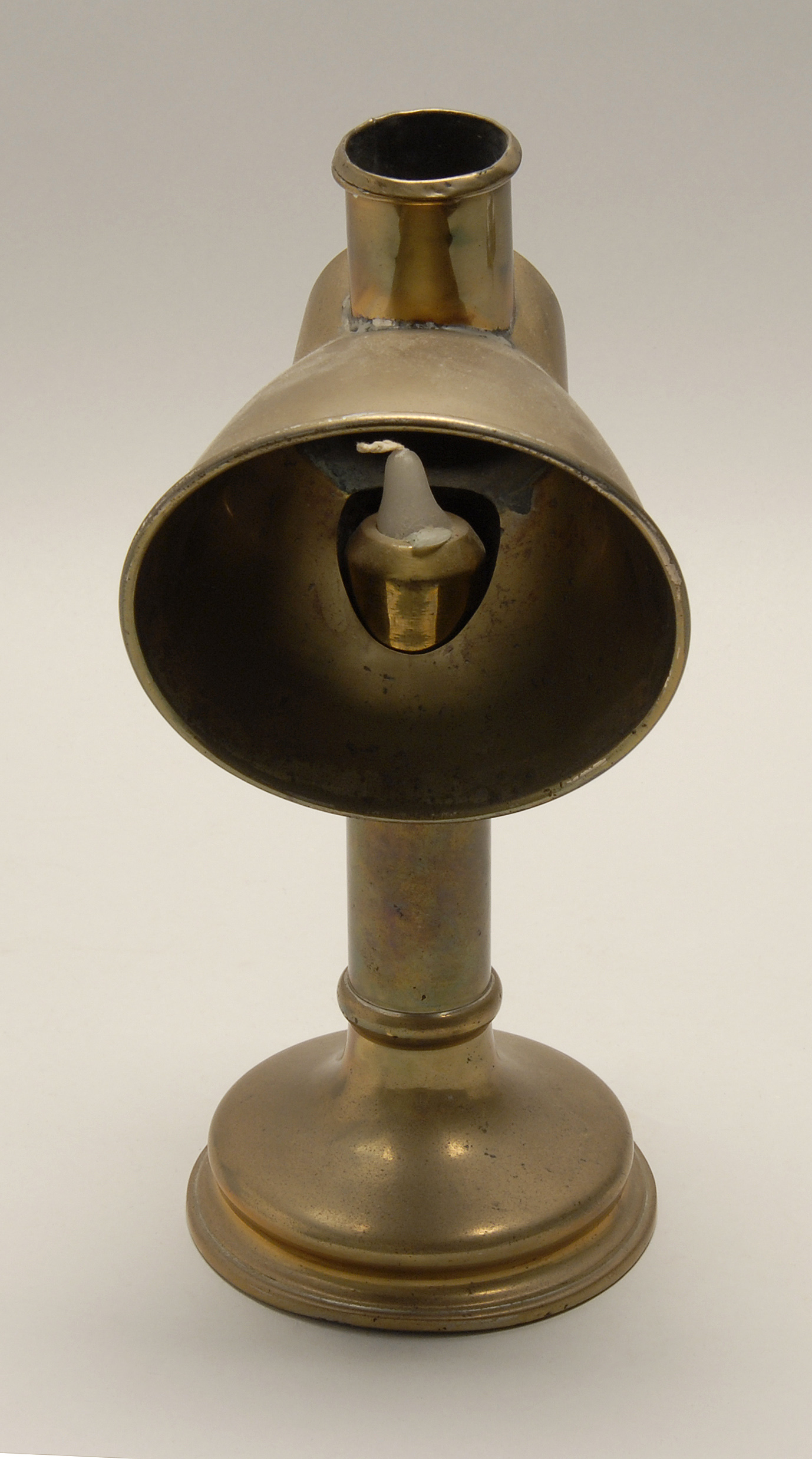 Appraisal: BRASS STUDENT CANDLE LAMP Mid- th CenturyWith brass conical-form reflective