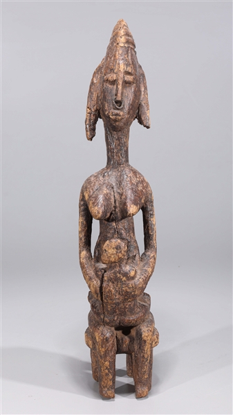 Appraisal: Carved wood African Dogon figure of a seated woman with