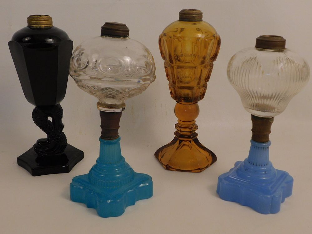 Appraisal: GLASS OIL LAMPS INCLUDING SANDWICH Includes early Sandwich Glass oil