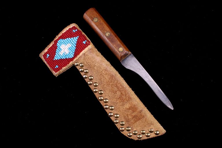 Appraisal: Blackfoot Tacked and Beaded Sheath Trade Knife This is a