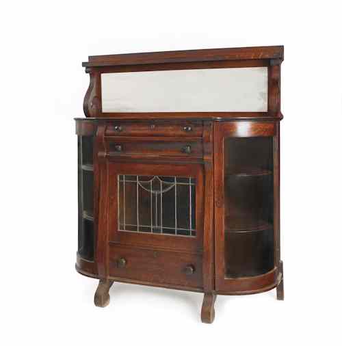 Appraisal: Empire oak server with a leaded glass door h w