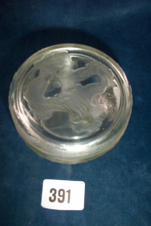 Appraisal: A Lalique circular box and cover with moulded and frosted