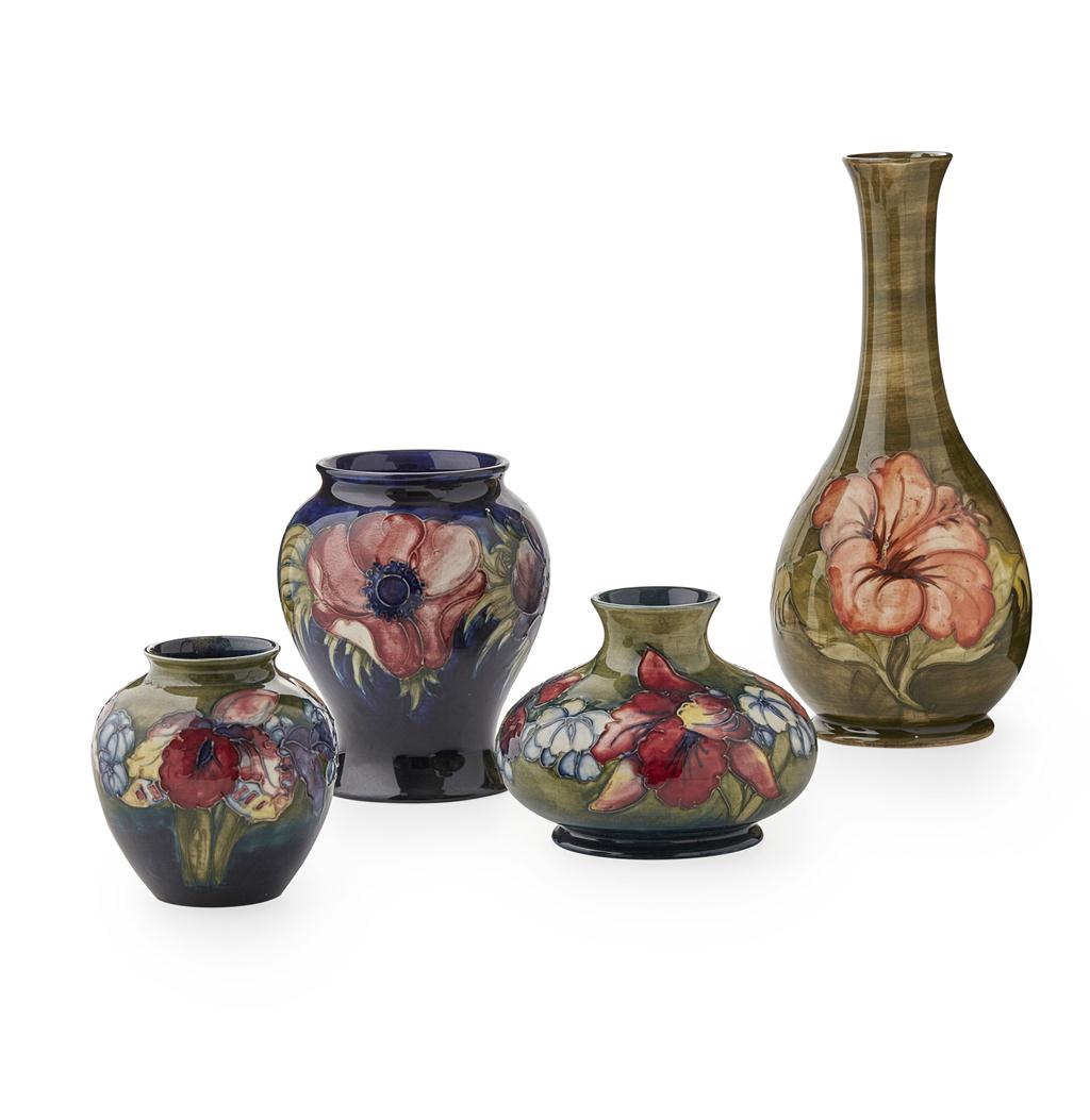 Appraisal: MOORCROFT POTTERY FOUR VASES S- S comprising an 'ORCHIDS' PATTERN