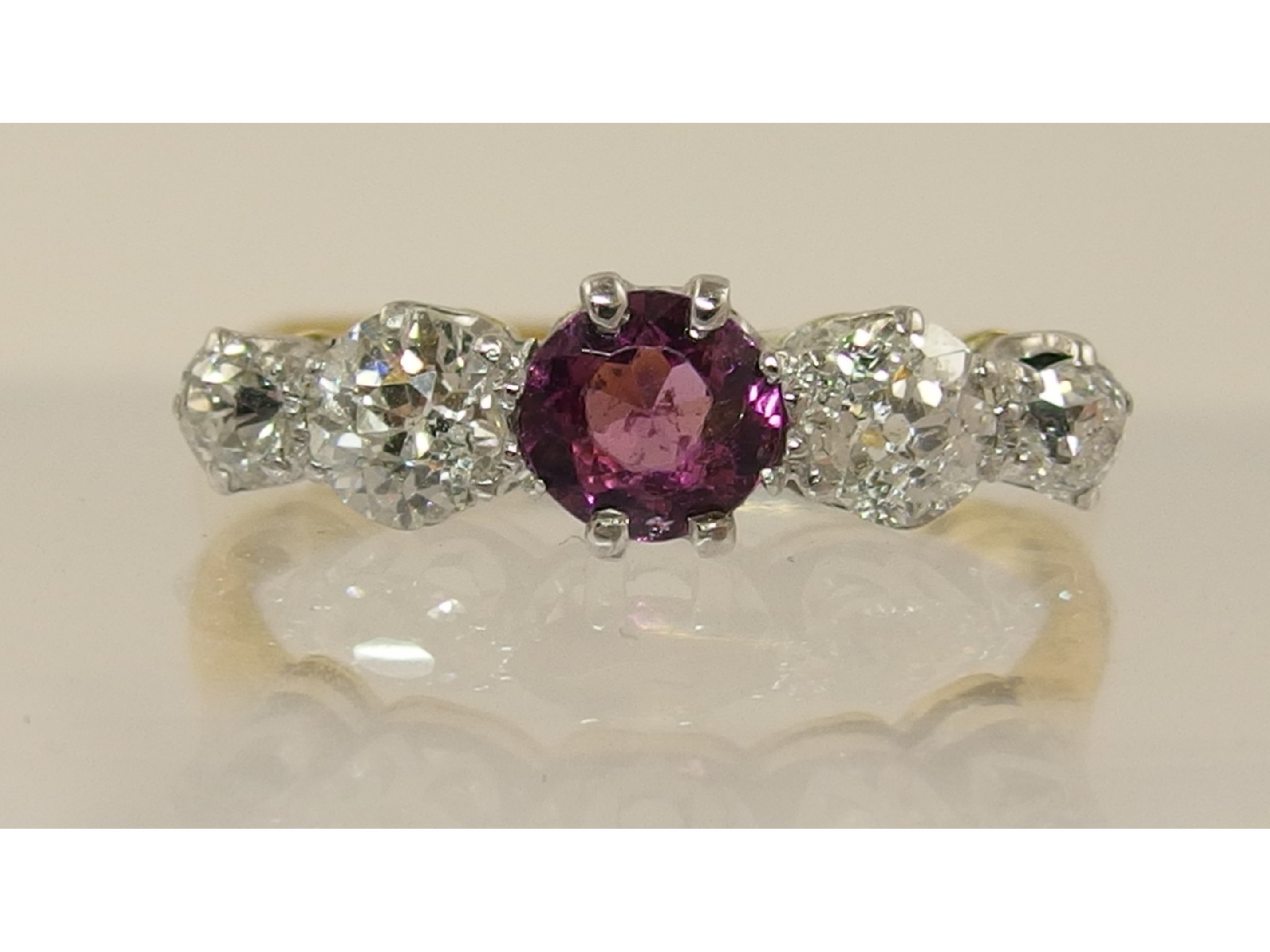 Appraisal: An ct diamond and pink gem stone ringset with four