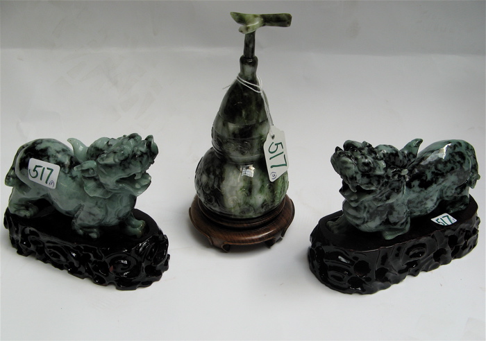 Appraisal: THREE HAND CARVED JADE PIECES pair of single horned creatures