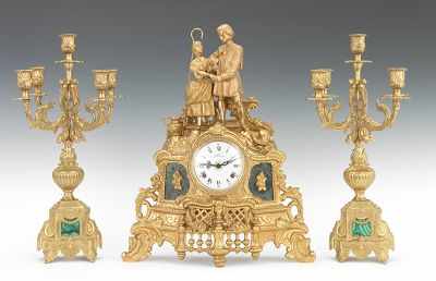 Appraisal: A Three Piece Clock Garniture Set Consisting of a large