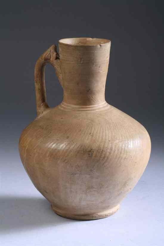 Appraisal: ISLAMIC OCHRE POTTERY EWER - in high