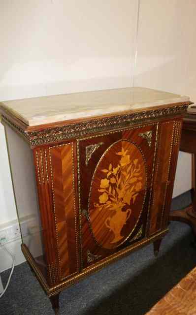 Appraisal: A FRENCH STYLE INLAID PIER CABINET with marble top and