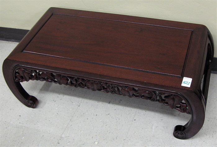 Appraisal: CHINESE ROSEWOOD COFFEE TABLE Ming period styling having a rectangular