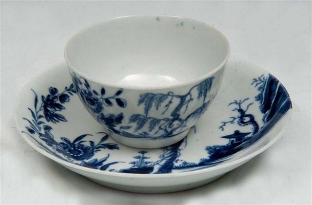 Appraisal: A WORCESTER TEA BOWL and saucer painted in the 'Landslip'