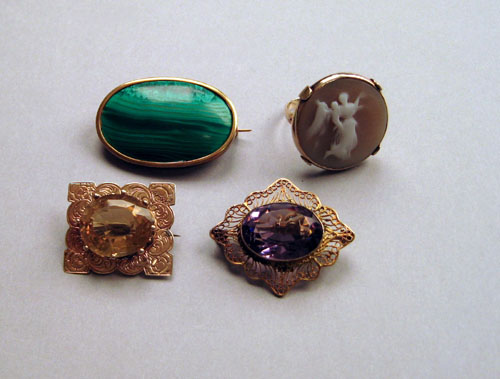 Appraisal: Three pins to include K yellow gold and amethyst pin