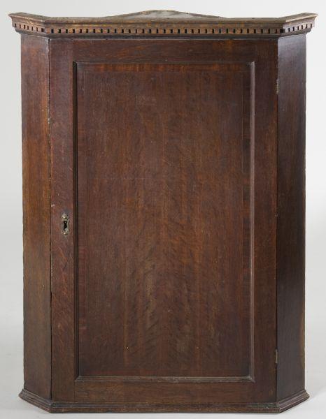 Appraisal: English Hanging Oak Corner Cabinet circa single paneled door highlighted