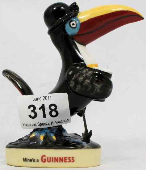 Appraisal: Royal Doulton Advertising Figure Guinness Miner Toucan MCL Limited Edition