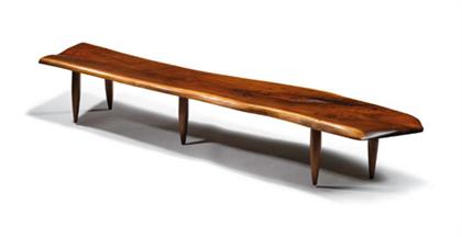 Appraisal: PHILLIP LLOYD POWELL american - Walnut bench Sculpted amorphous top