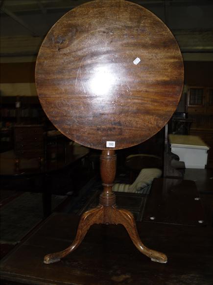 Appraisal: A George III circular mahogany wine table