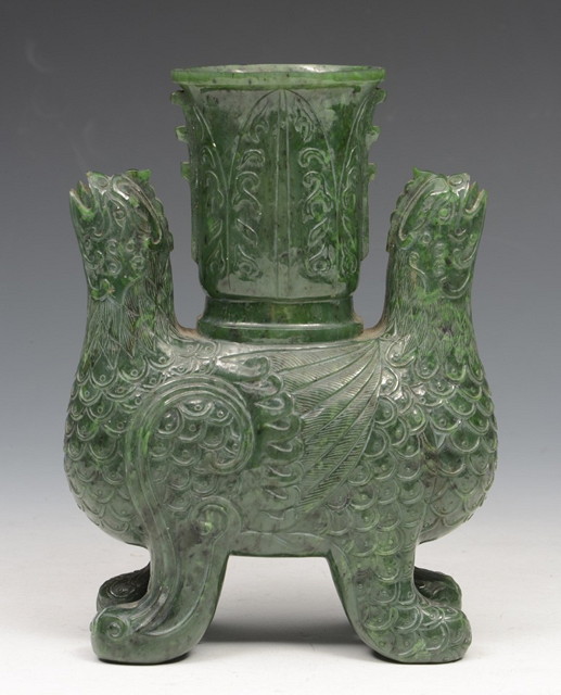 Appraisal: A CHINESE GREEN JADE VASE of double mythological bird form