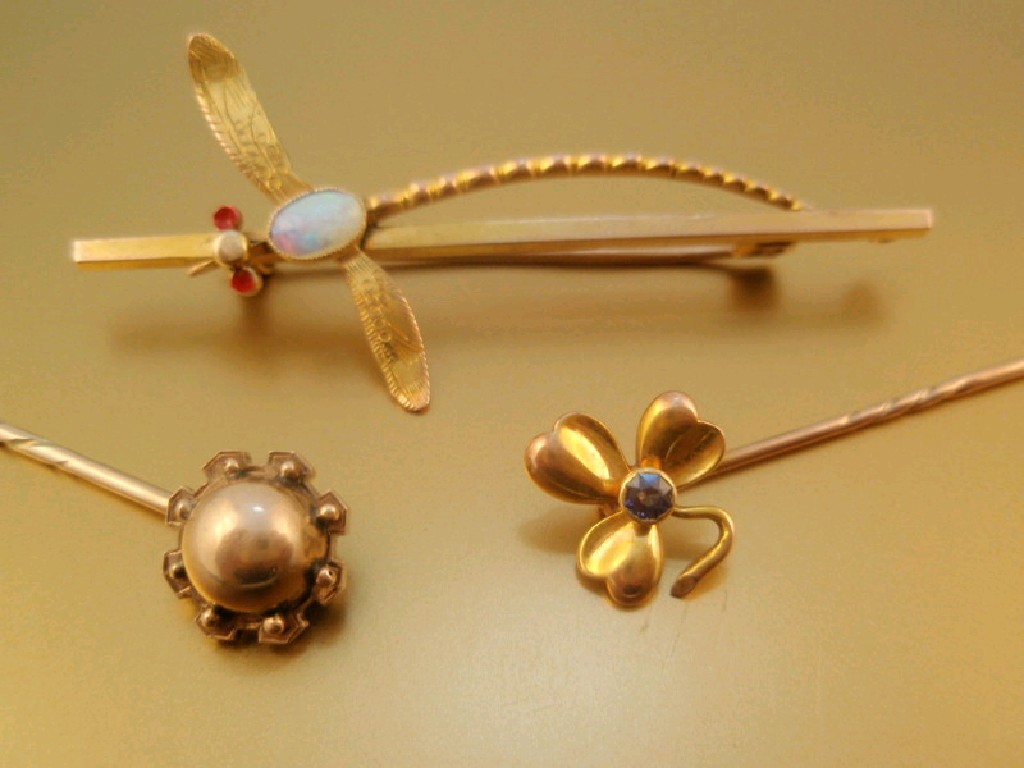 Appraisal: A bar brooch with attached insect stamped ct together with