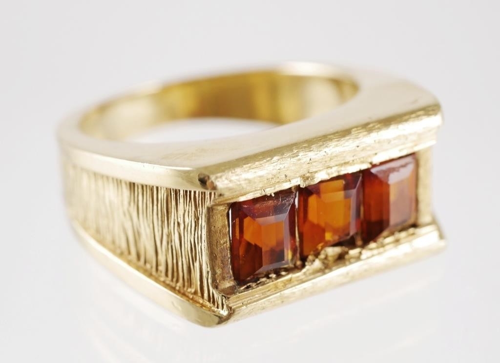 Appraisal: K yellow gold ring containing Madeira citrines channel set side