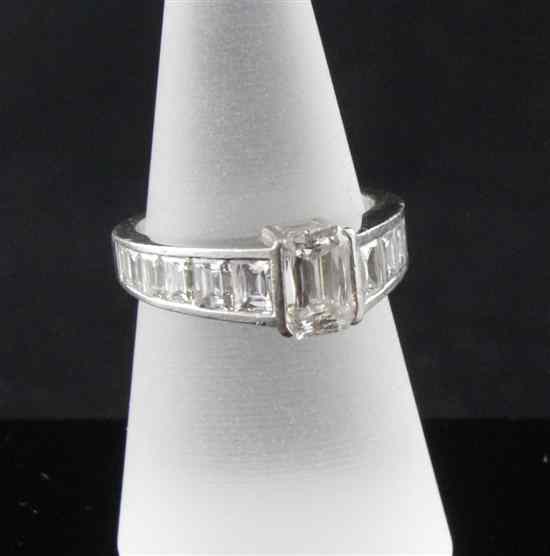 Appraisal: A platinum and diamond dress ring with central rectangular cut