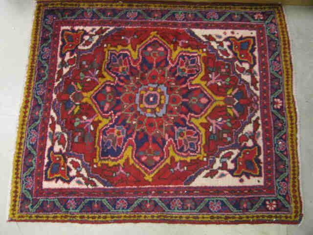 Appraisal: Heriz Persian Handmade Rug floral center rich red field '