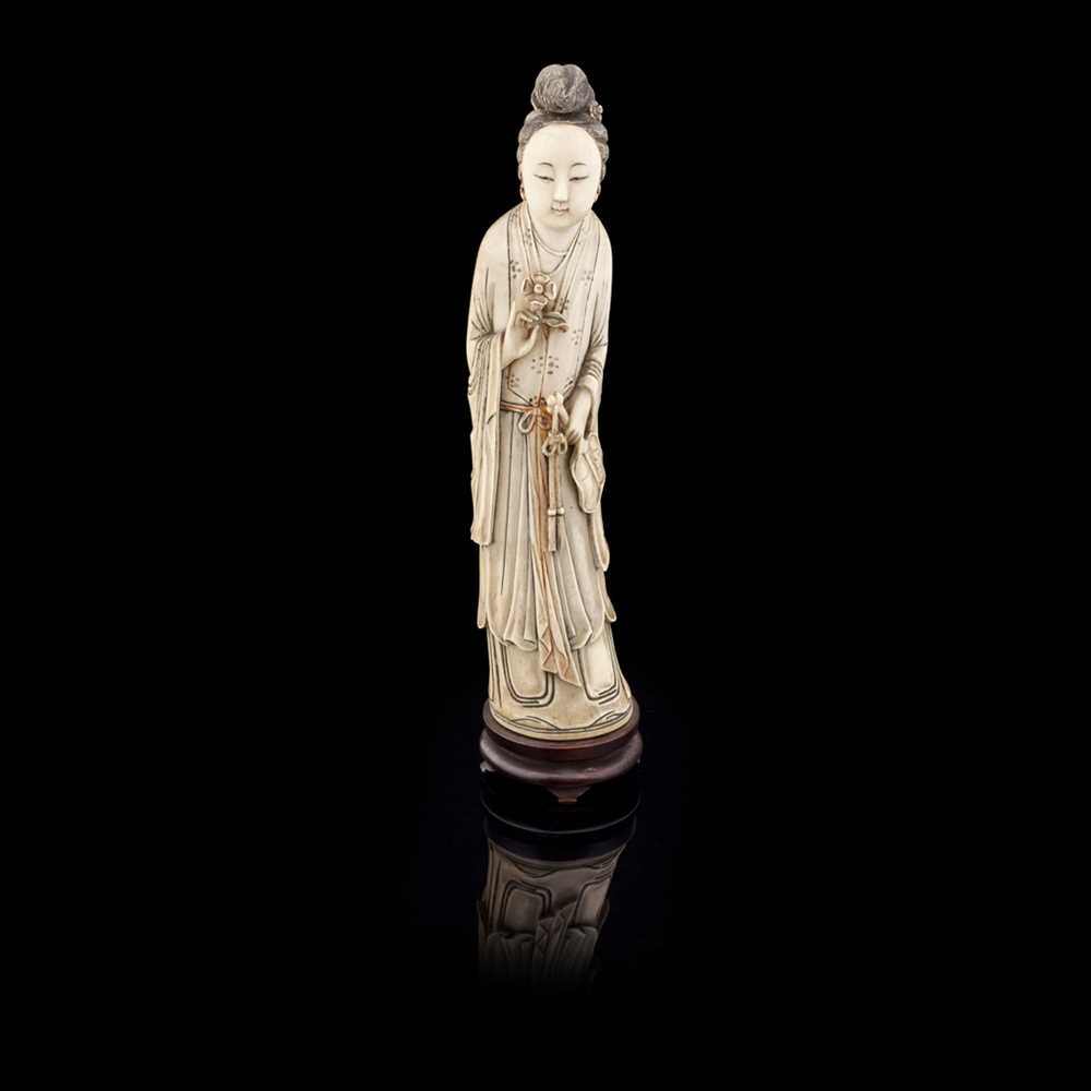 Appraisal: Y CHINESE CARVED IVORY FIGURE OF A LADY the standing