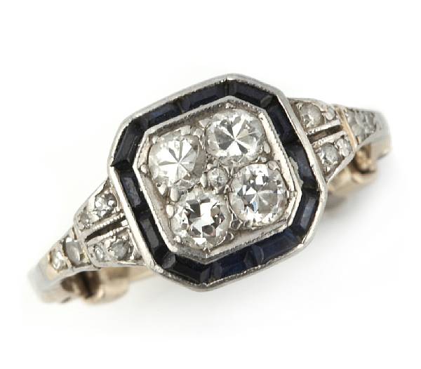 Appraisal: A diamond blue stone platinum and k gold ring with