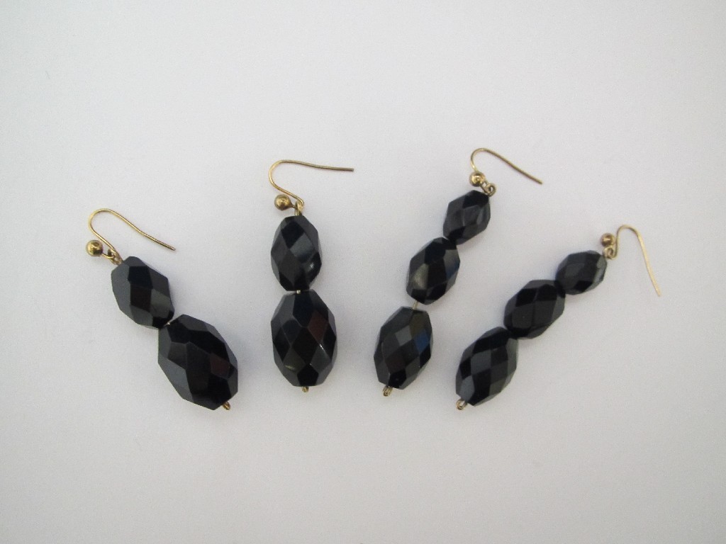 Appraisal: Two pairs of faceted French jet earrings on gold wire