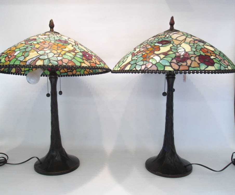 Appraisal: PAIR TIFFANY STYLE TABLE LAMPS stained and leaded glass shade