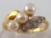 Appraisal: A French hallmarked carat gold cultured pearl diamante ring pearls